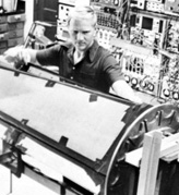 Physicist and Fundamental Fysiks Group member John Clauser with his contraption to test Bell’s theorem at Berkeley, 1970s. Click to enlarge.